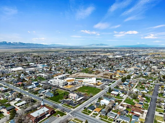 Expansive aerial perspective showcasing a residential area with varied housing styles