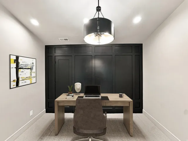 Recessed lighting, drum pendant light fixture, wainscoting accent wall, light-toned carpeting