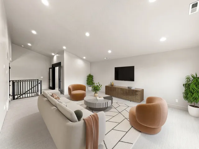 Recessed lighting, sloped ceiling, wood-finish flooring, black metal railing, and double French doors