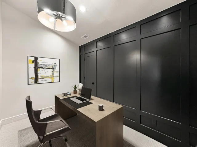 Accent wall with wainscoting details, recessed ceiling lighting, and a contemporary semi-flush mount fixture