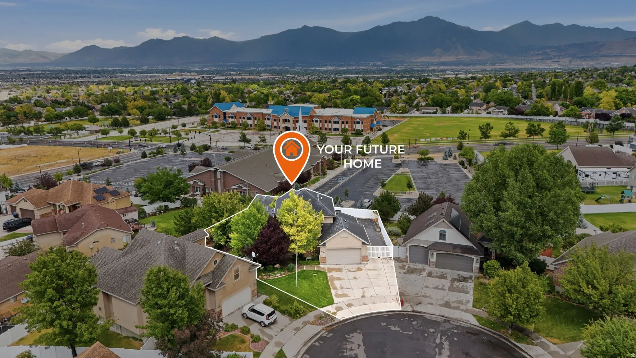 Aerial perspective showcasing a cul-de-sac property with mature landscaping and a well-maintained lawn
