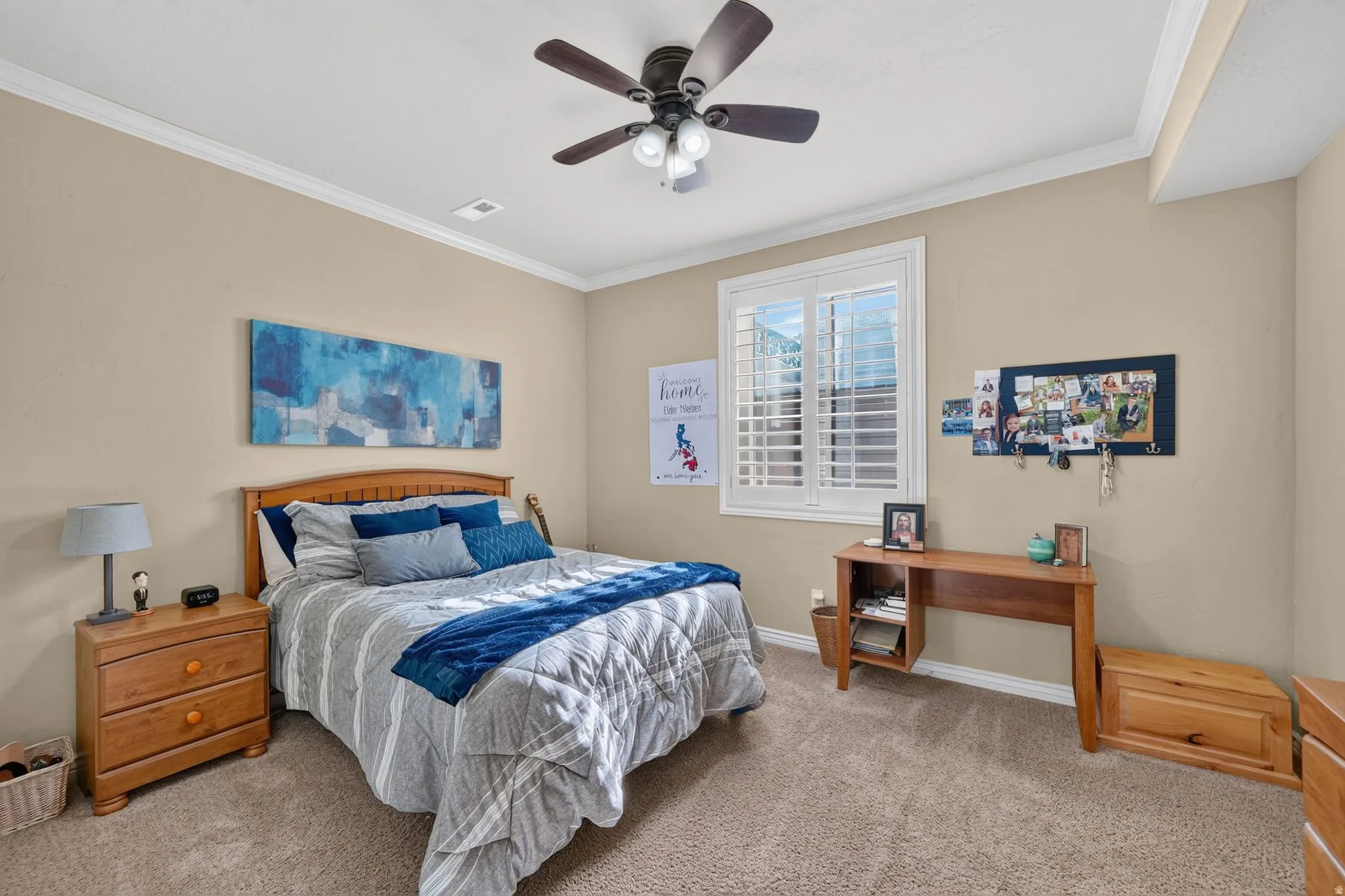 First basement bedroom with huge walk in closet, lots of natural light, and storage closet