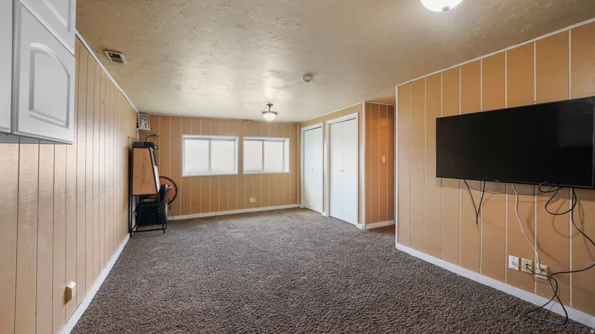 Large Family on Lower Level, Could easily put up one wall and a door and have a 4th BR