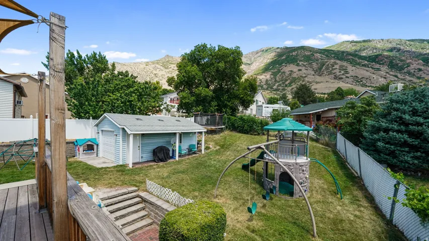 Large back yard with separate detached garage/shop