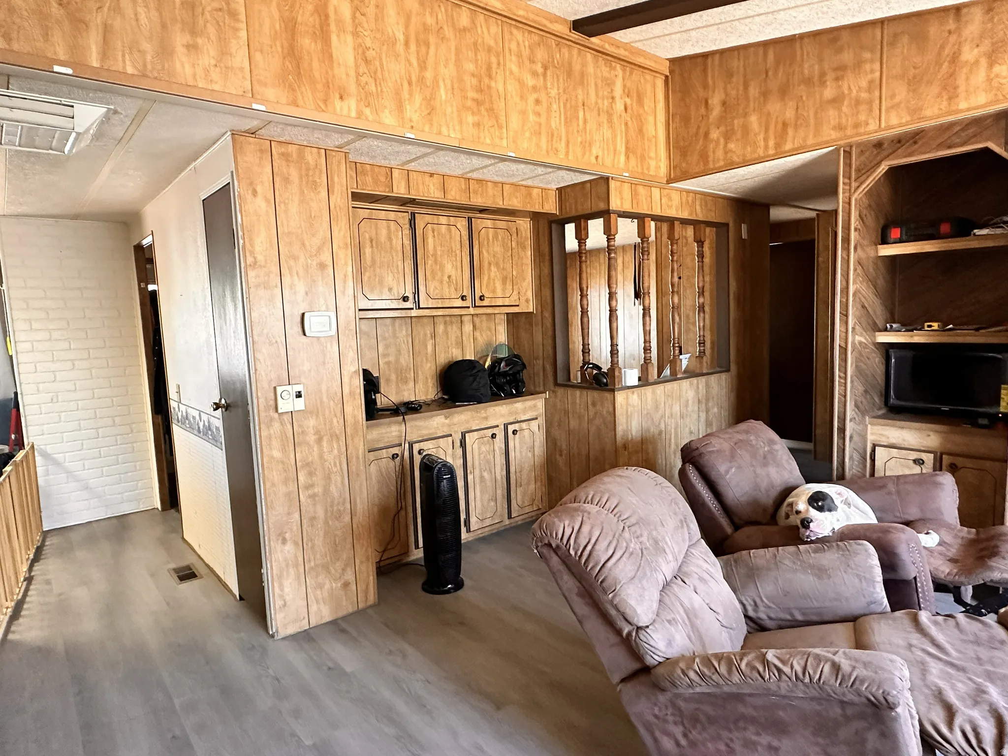 Wood-panel walls and ceiling accents