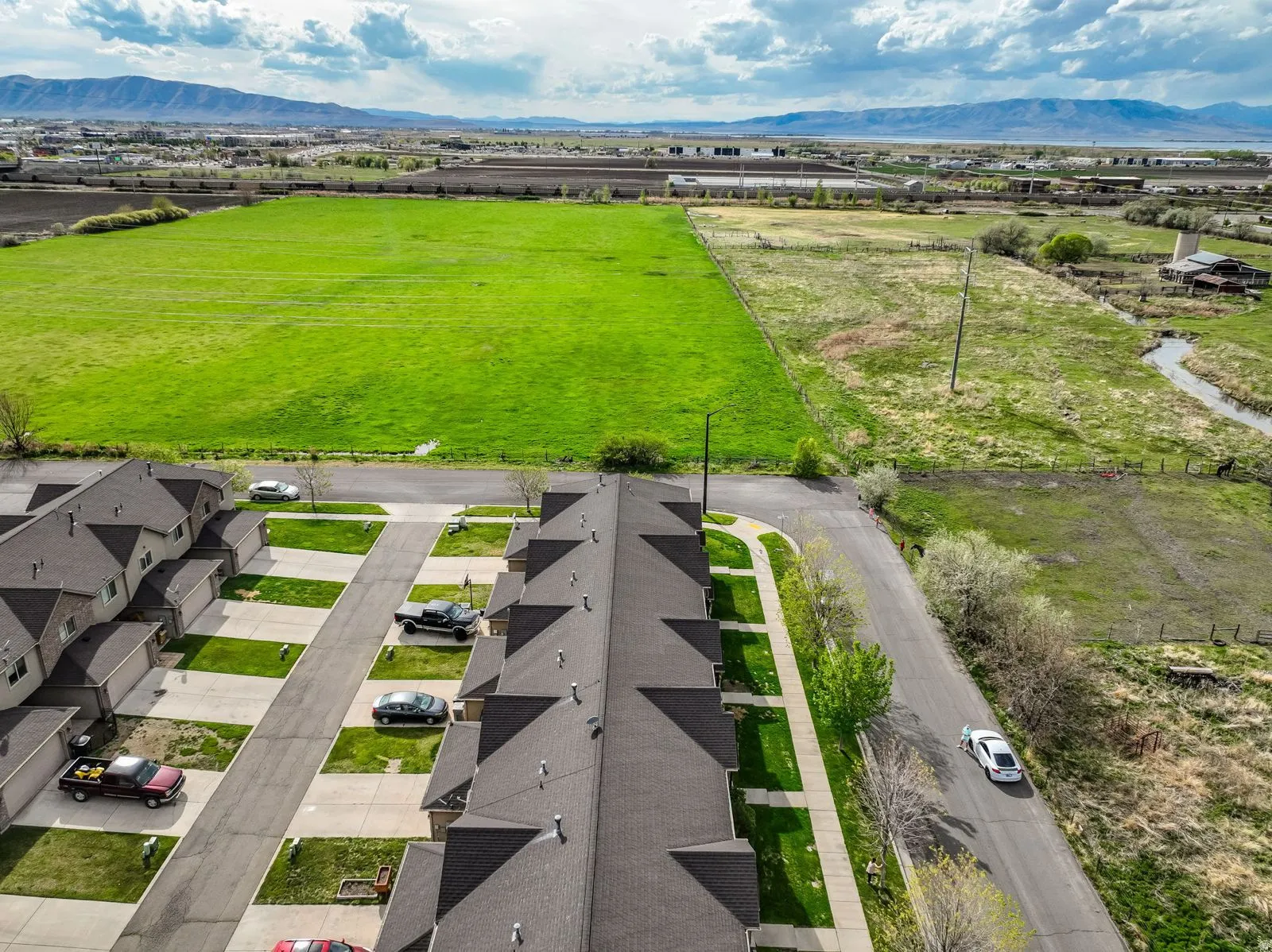 Townhome community featuring individual garages and private driveways
