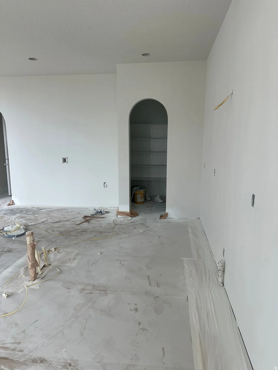 Kitchen looking into pantry