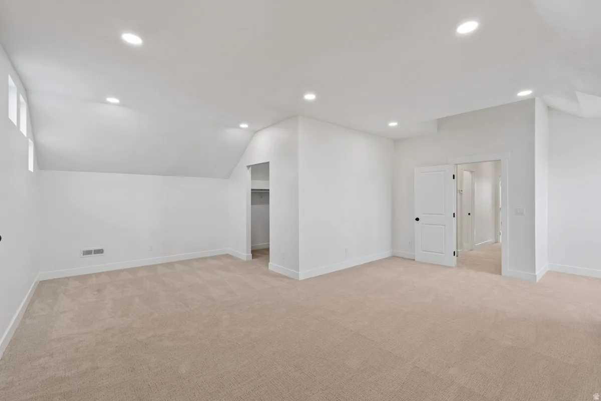 Spacious bedroom on the second floor with walk in closet, nook area. could be used as a large bedroom or loft area.