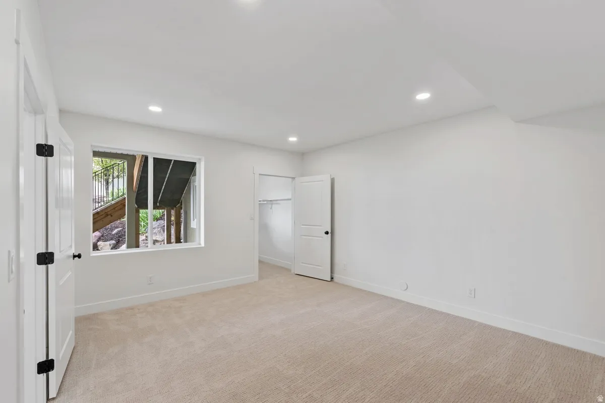 Private bedroom in the basement with a walk in closet