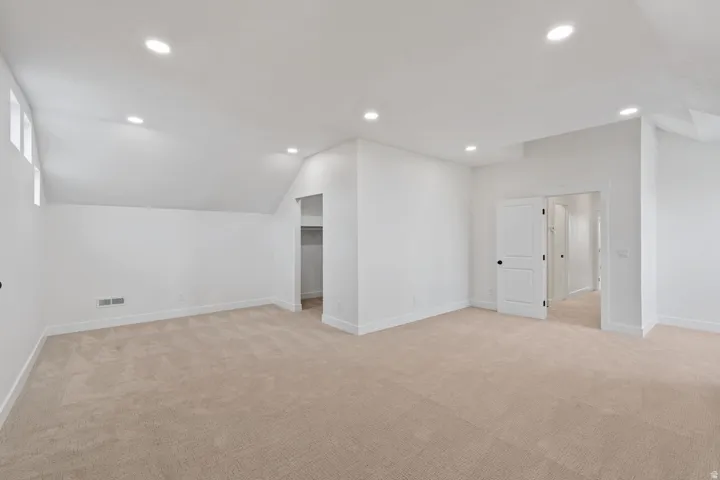 Spacious bedroom on the second floor with walk in closet, nook area. could be used as a large bedroom or loft area.