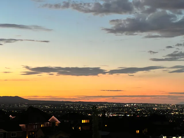 Expansive valley views with beautiful sunsets and city lights stretching across the horizon.