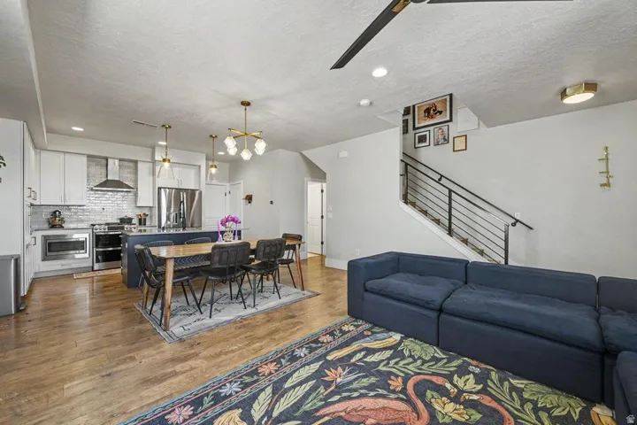 Open-concept living space featuring wood-finish flooring