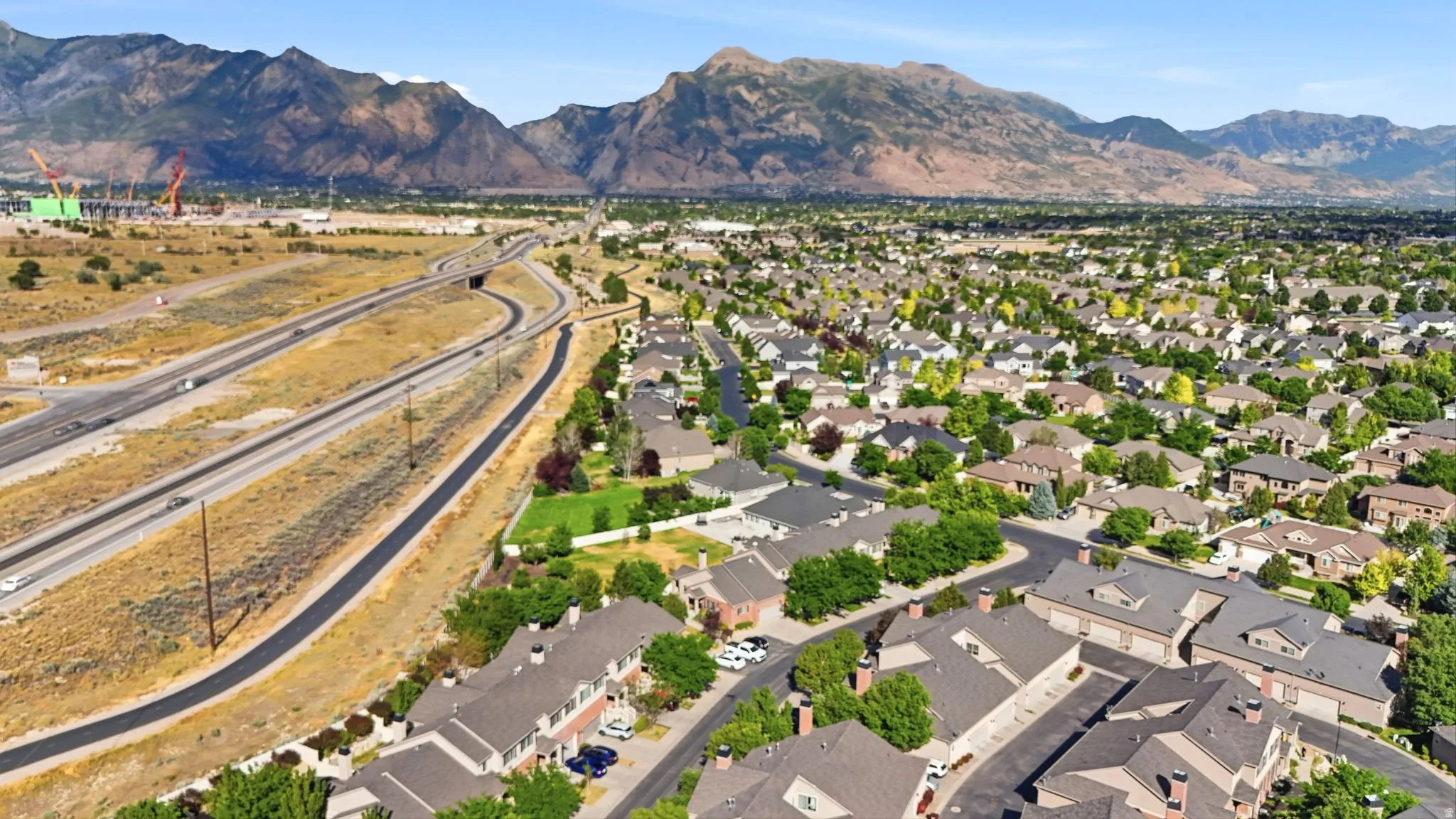 Expansive residential area featuring numerous single-family homes and townhouses