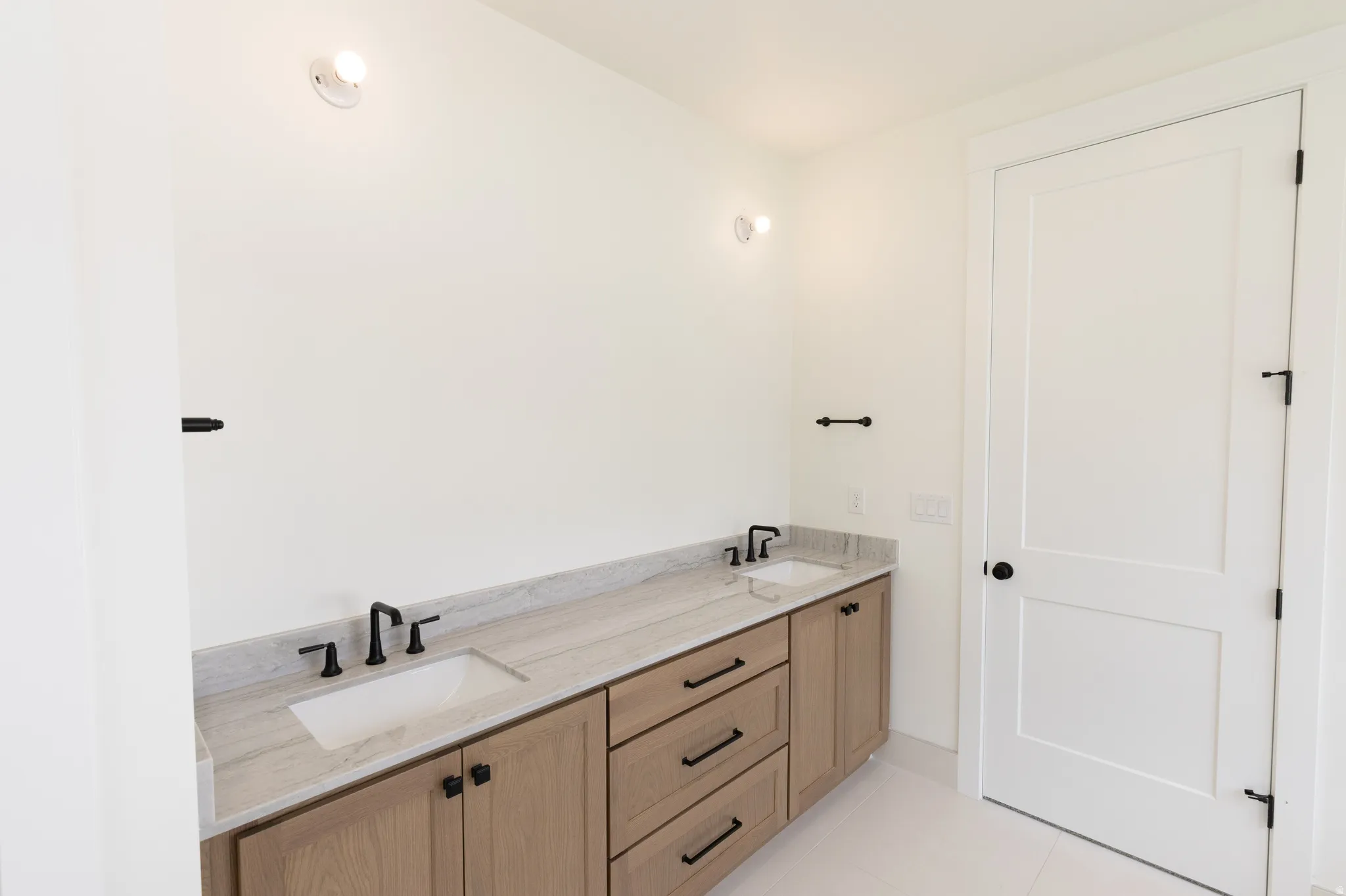Dual vanity with stone countertop and integrated sinks