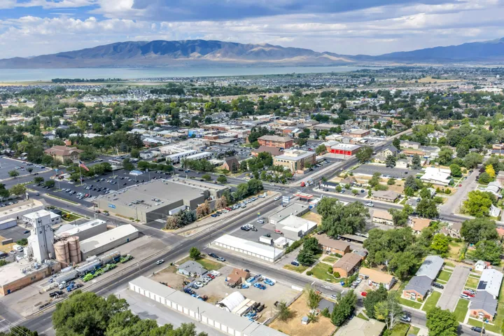Aerial perspective showcasing a mixed-use district with commercial and residential properties