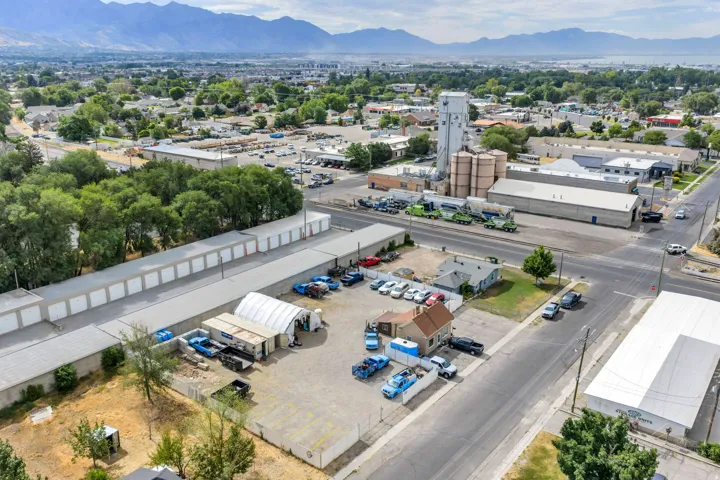 Aerial perspective showcasing commercial properties and street access