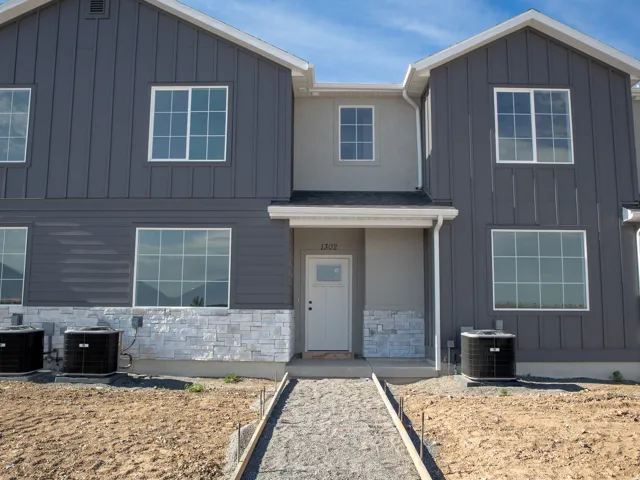 Front of the home. Full landscaping will be put in and maintained.