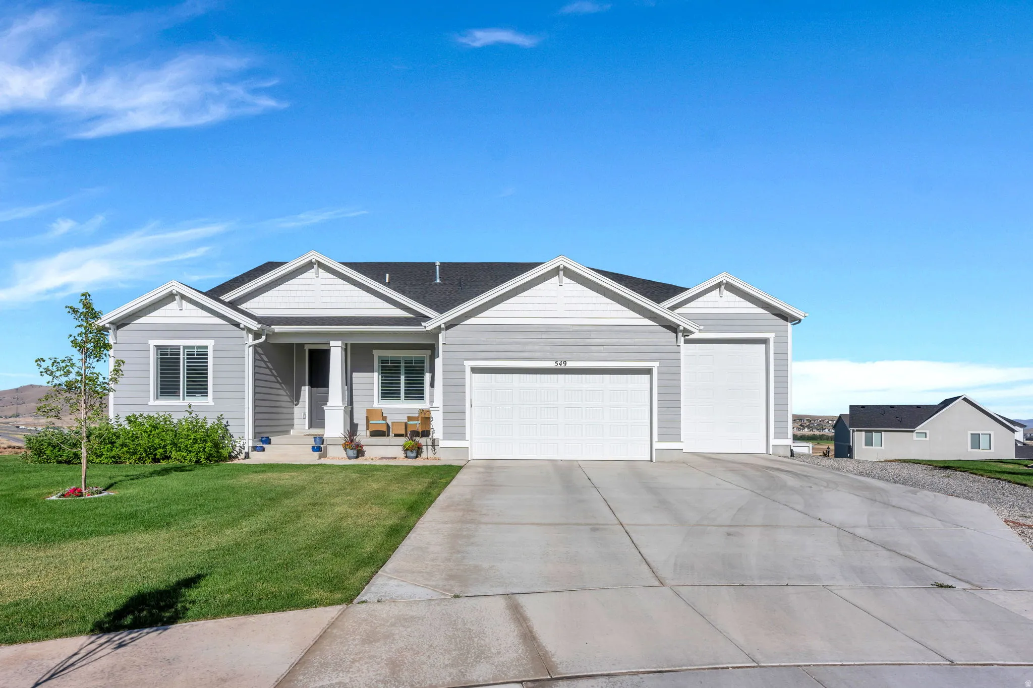 Home with 3 Car Garage/RV height, with extra space  parking