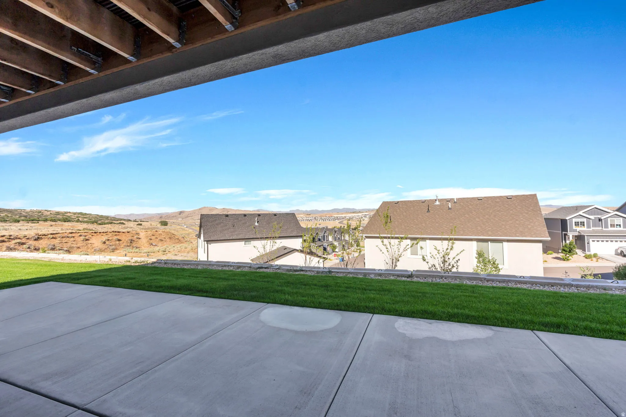 Covered Patio View from Basement Exterior Entrance