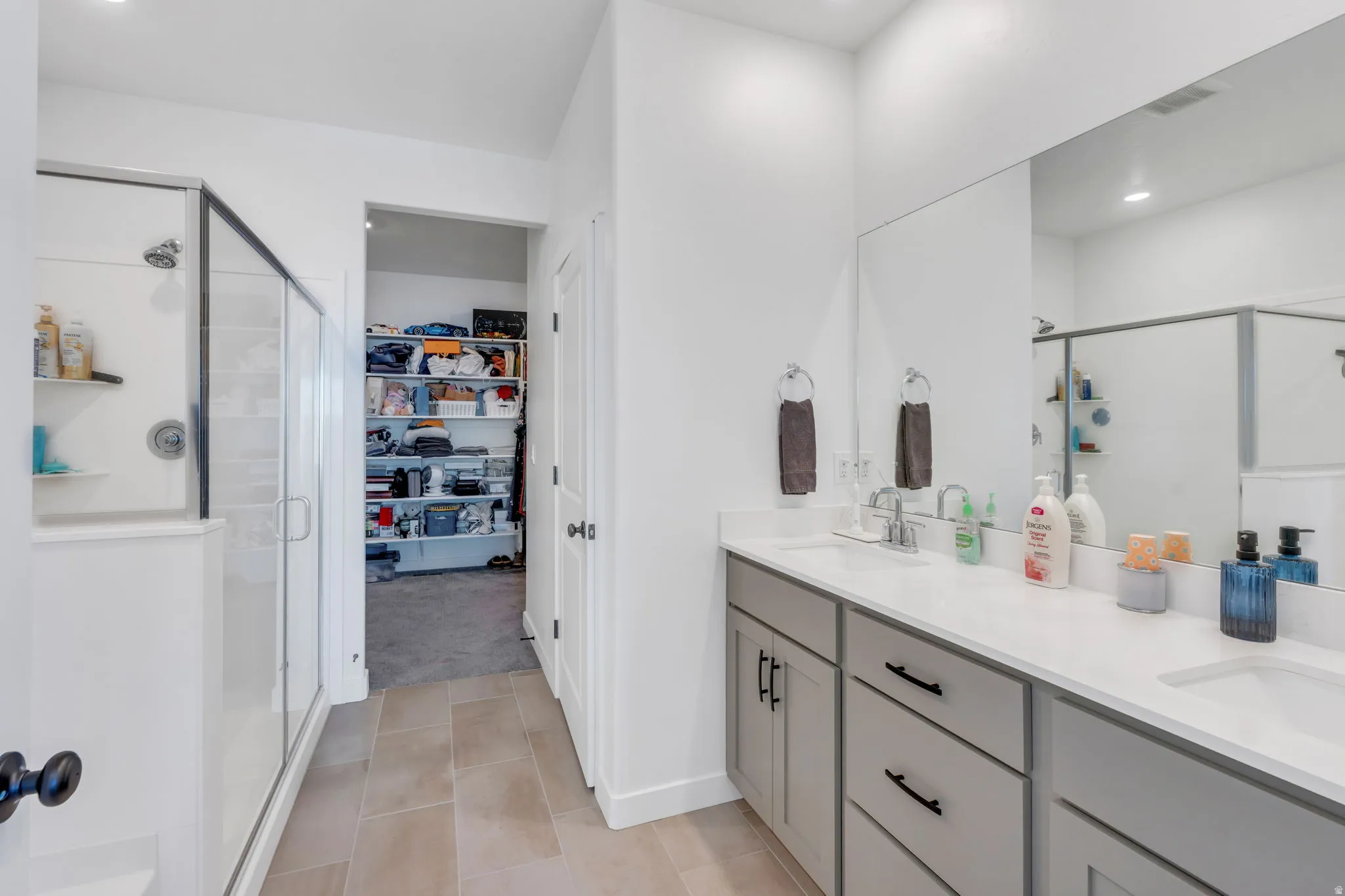 Primary Suite Bathroom with separate tub & shower.