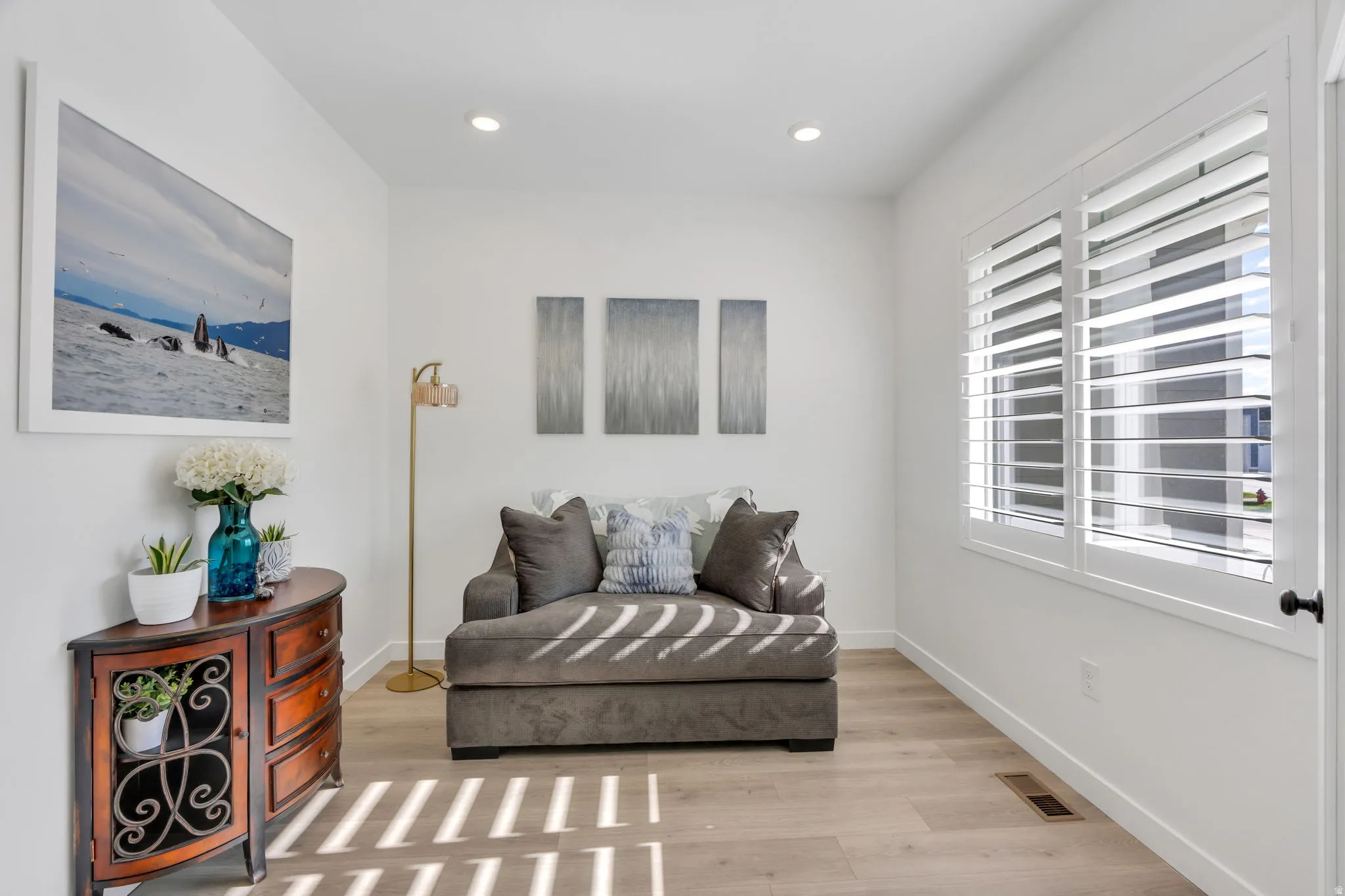 Front Room Includes Plantation shutters.  Could be an office.