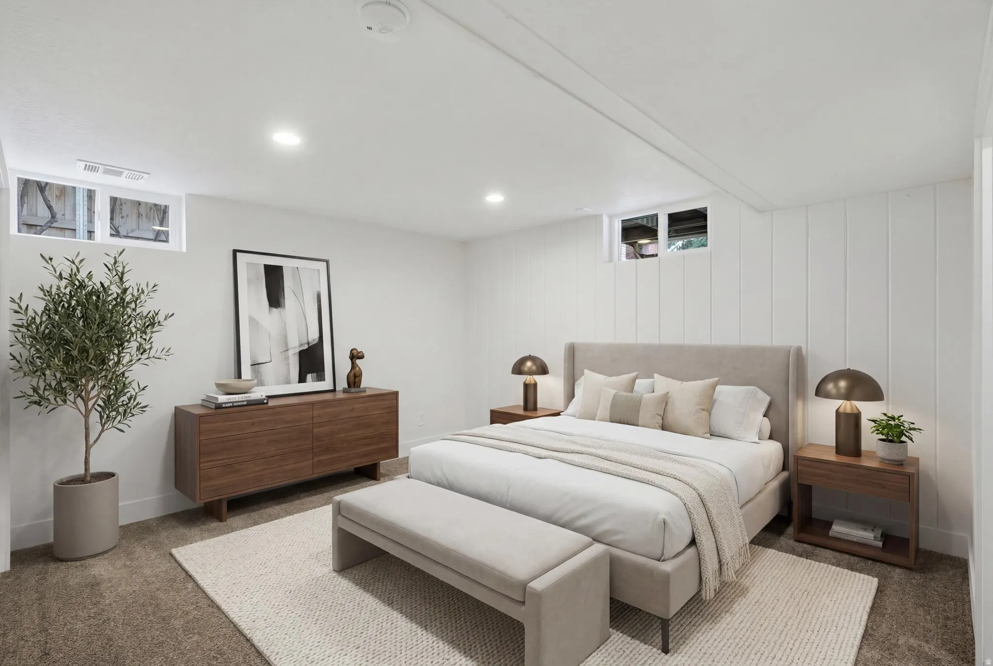 Virtually staged. Carpeted room featuring white walls, recessed lighting, and a white paneled accent wall