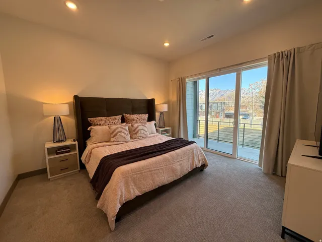 Bedroom featuring recessed lighting and wall-to-wall carpeting