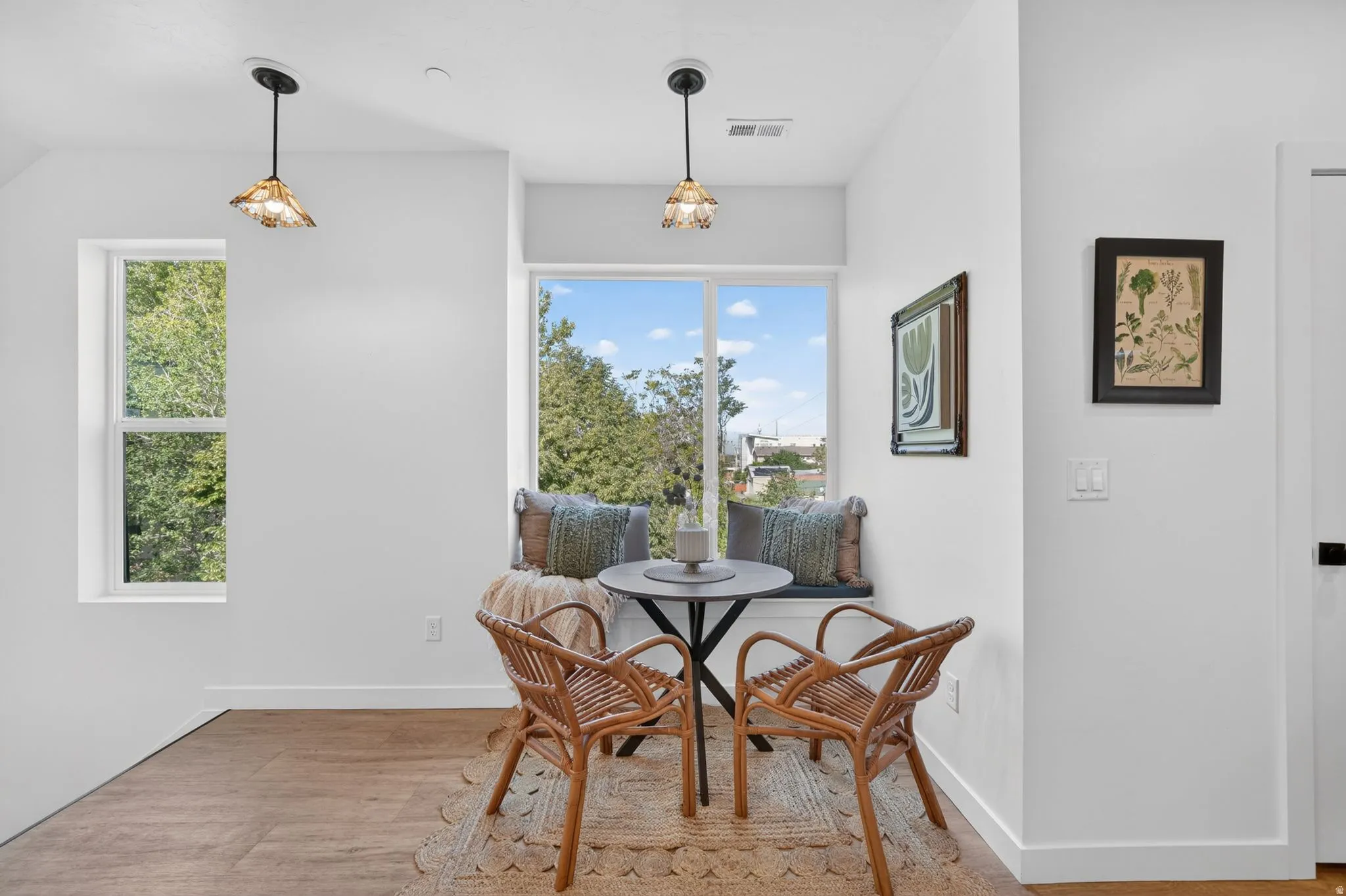 Built-in window bench seating with a view of greenery