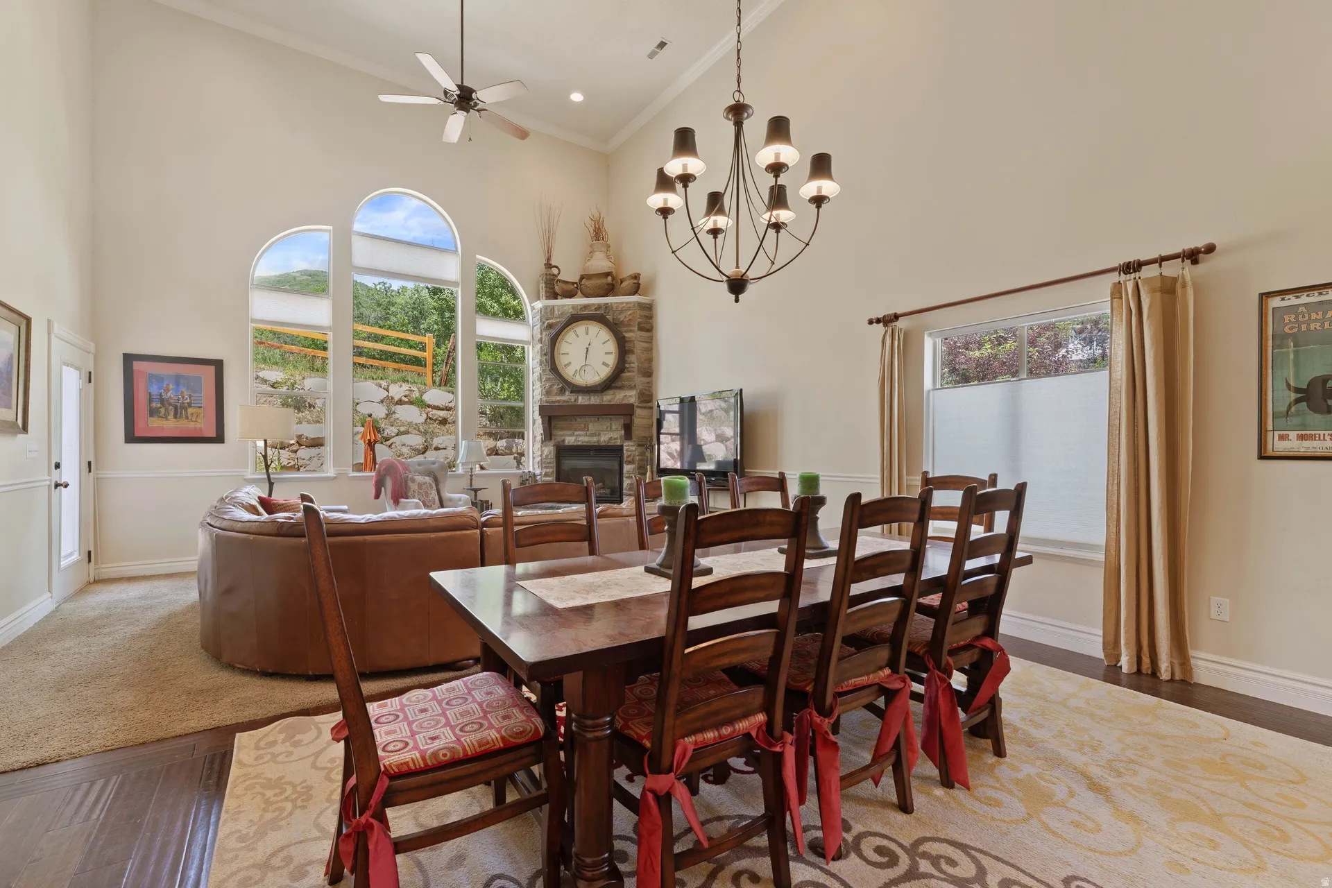 Dining area with dark wood-finish flooring and a decorative area rug