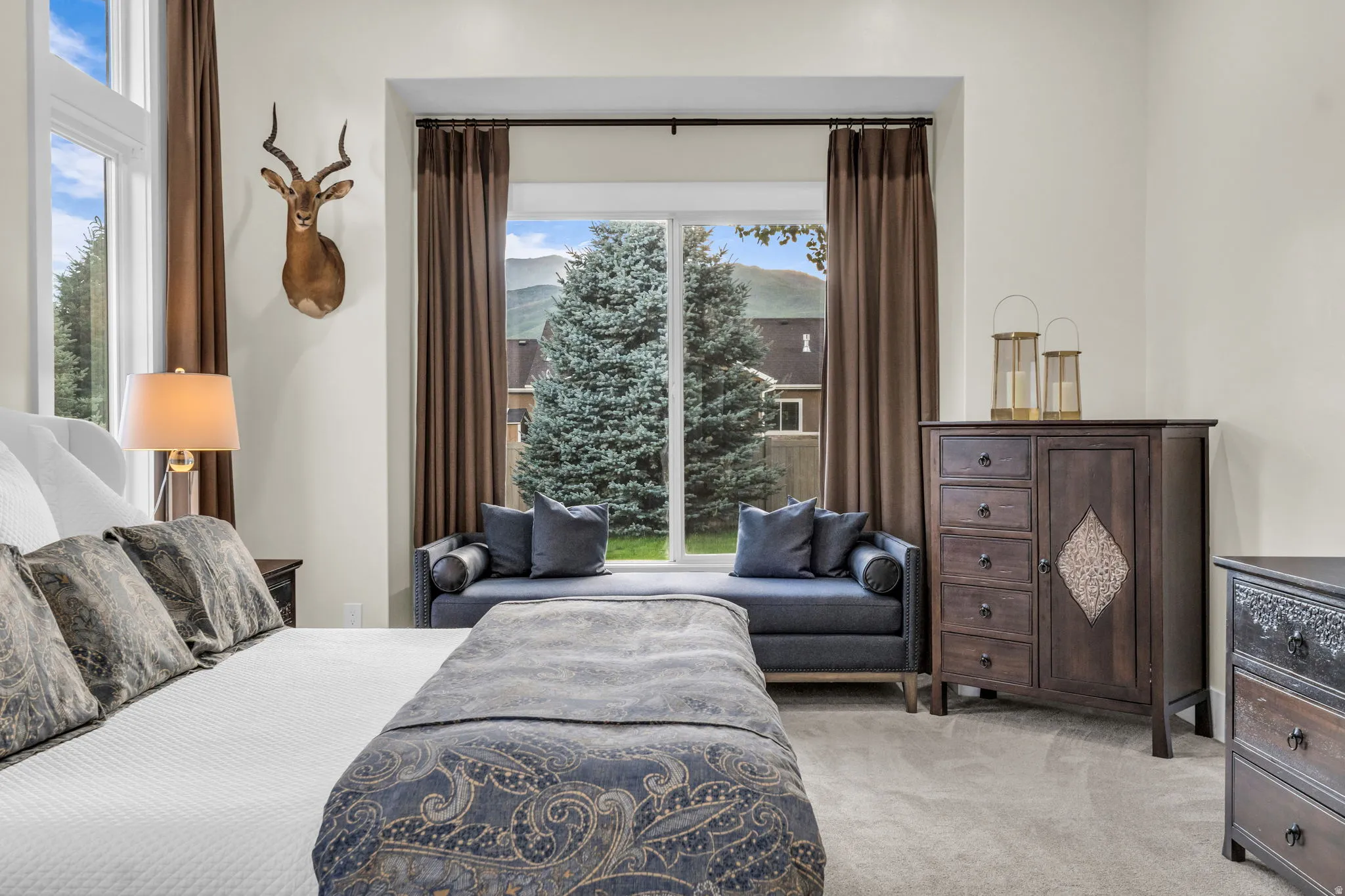 Plush carpeting throughout with a window seat