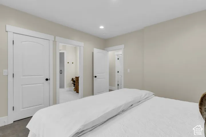 Soft neutral-toned walls complement white trim and doors