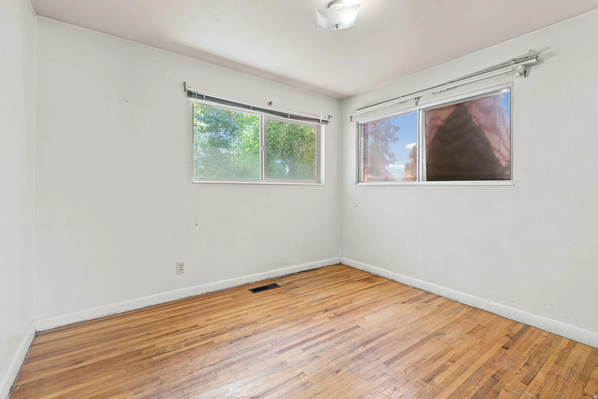 Interior room featuring hardwood flooring