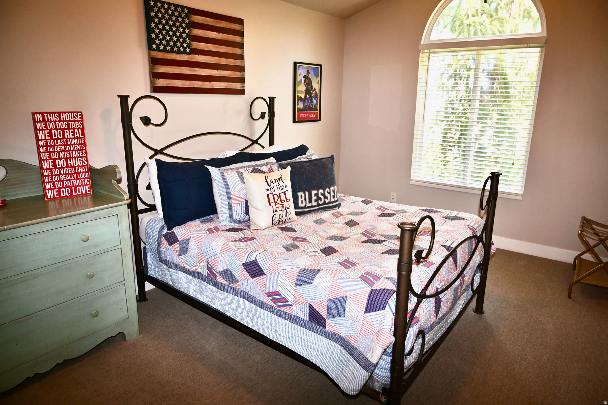 Arched window with blinds providing natural illumination