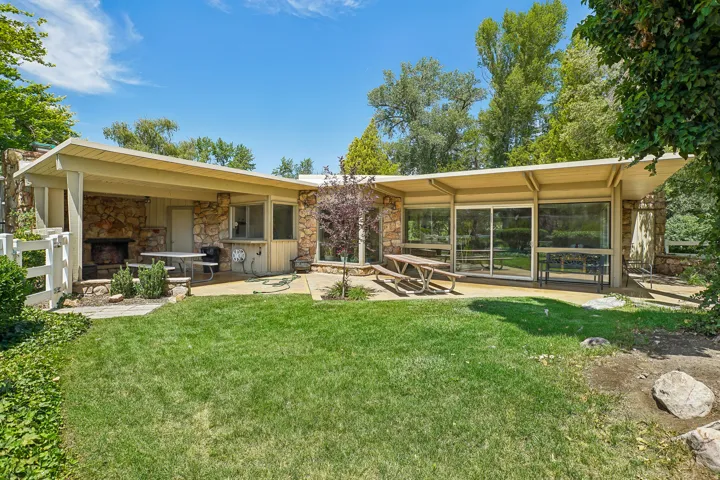 Expansive backyard with a manicured lawn
