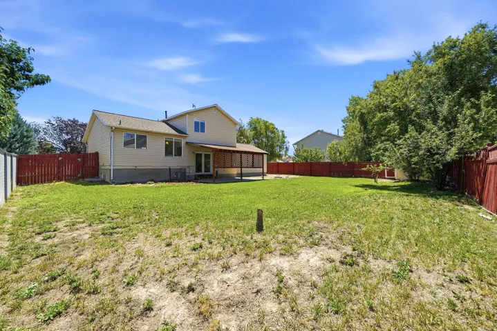 Expansive backyard with a full perimeter fence