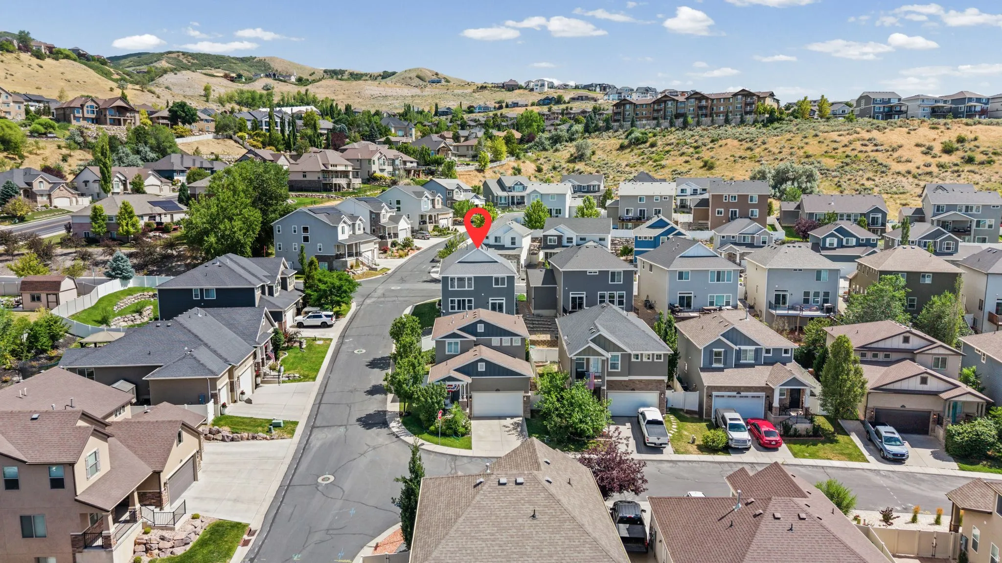 Residential neighborhood featuring a paved street and varied architectural styles