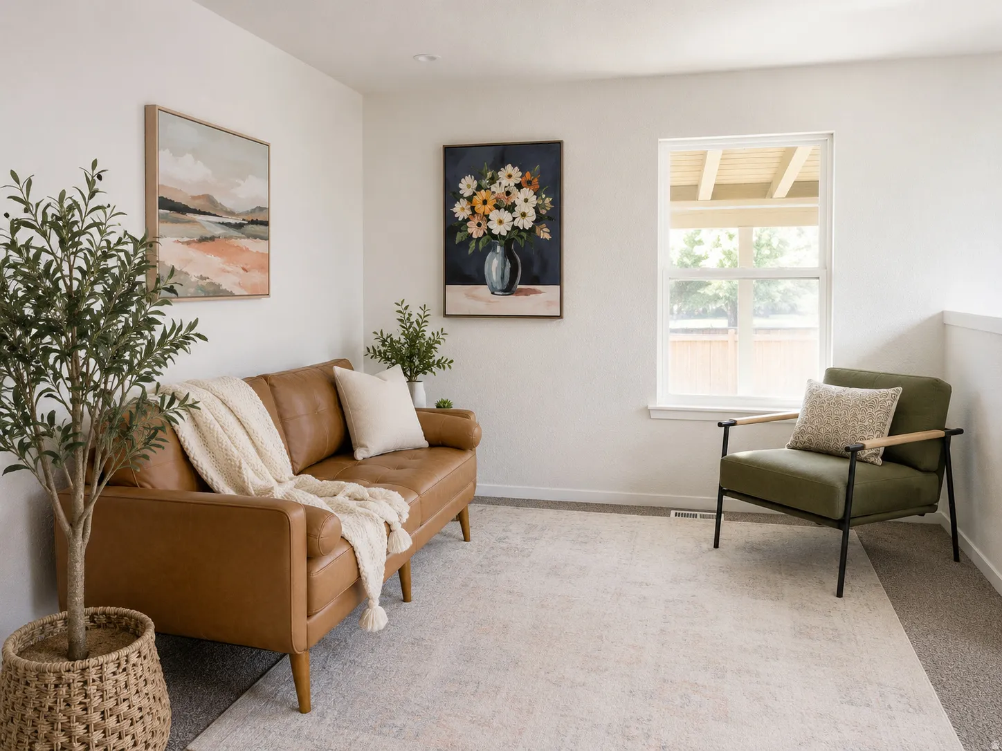 Bright room with white walls, recessed lighting, and a single-pane window