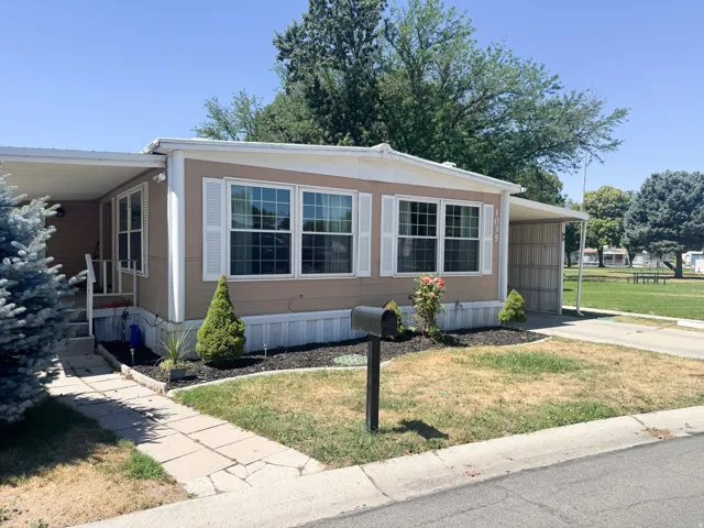 Tan exterior with white trim