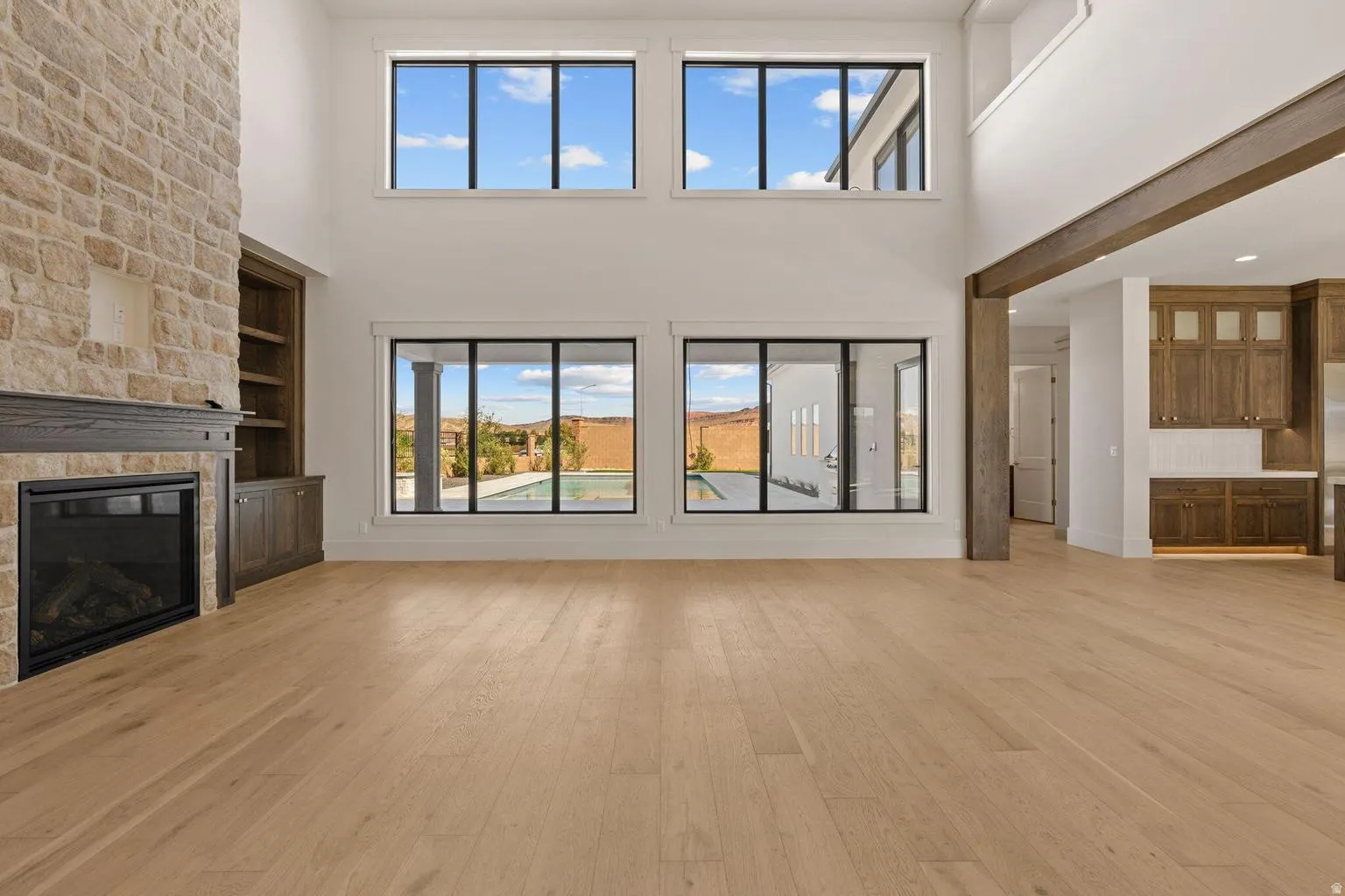 Soaring ceilings with extensive window fenestration