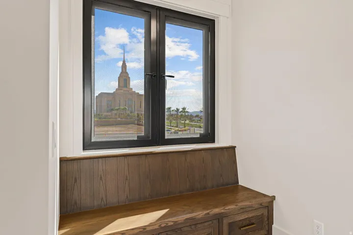 Built-in wood-finish bench with integrated storage drawers