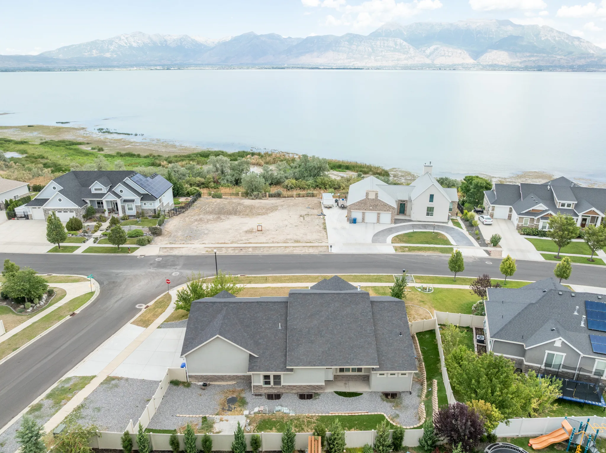 Aerial view shows the proximity and view of Utah Lake just across the street.