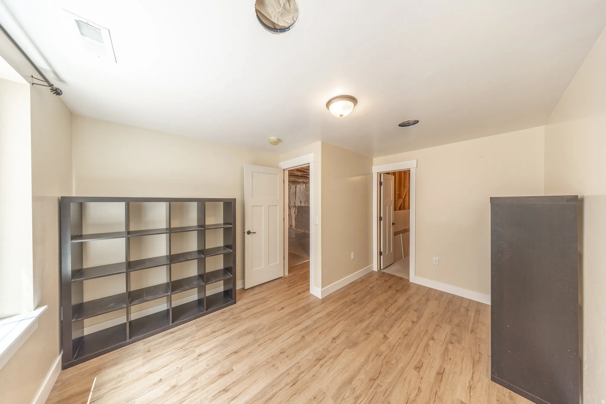 Bedroom #4 is in the basement and would be a suite when the adjoining bathroom is finished.