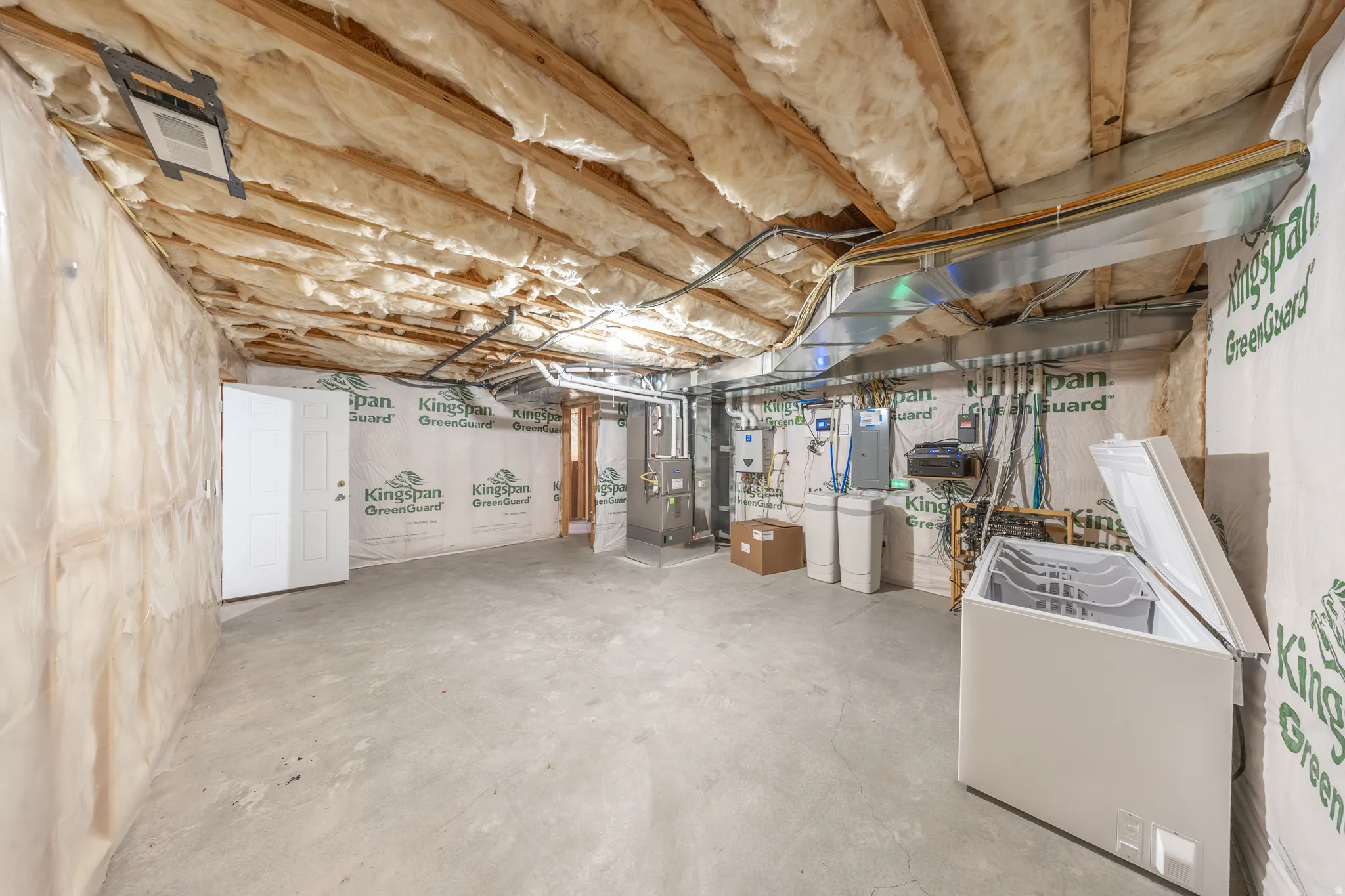 Huge utility/storage room could be finished as another bedroom. High efficiency furnace includes a humidifier. Tankless water heater provides hot water on demand.
