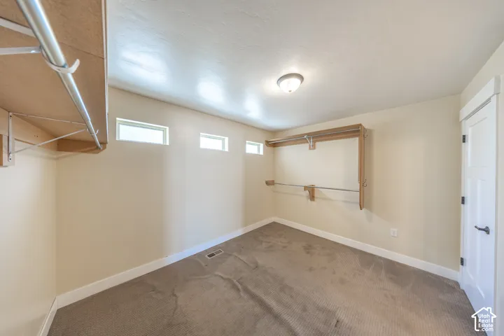 Primary suite also provides a large walk-in closet...WITH a closet. (on the right)