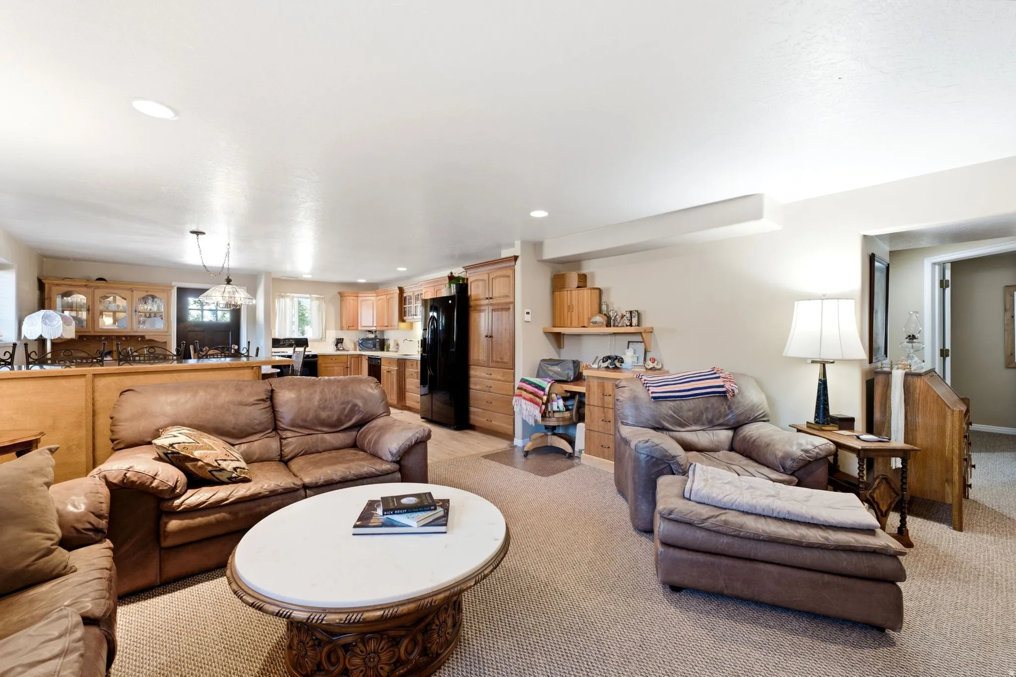 Lower level Open concept living area featuring recessed lighting