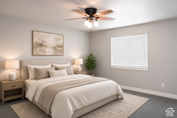 Recessed ceiling fan with integrated lighting, window with horizontal blinds, neutral wall paint, and gray carpet flooring