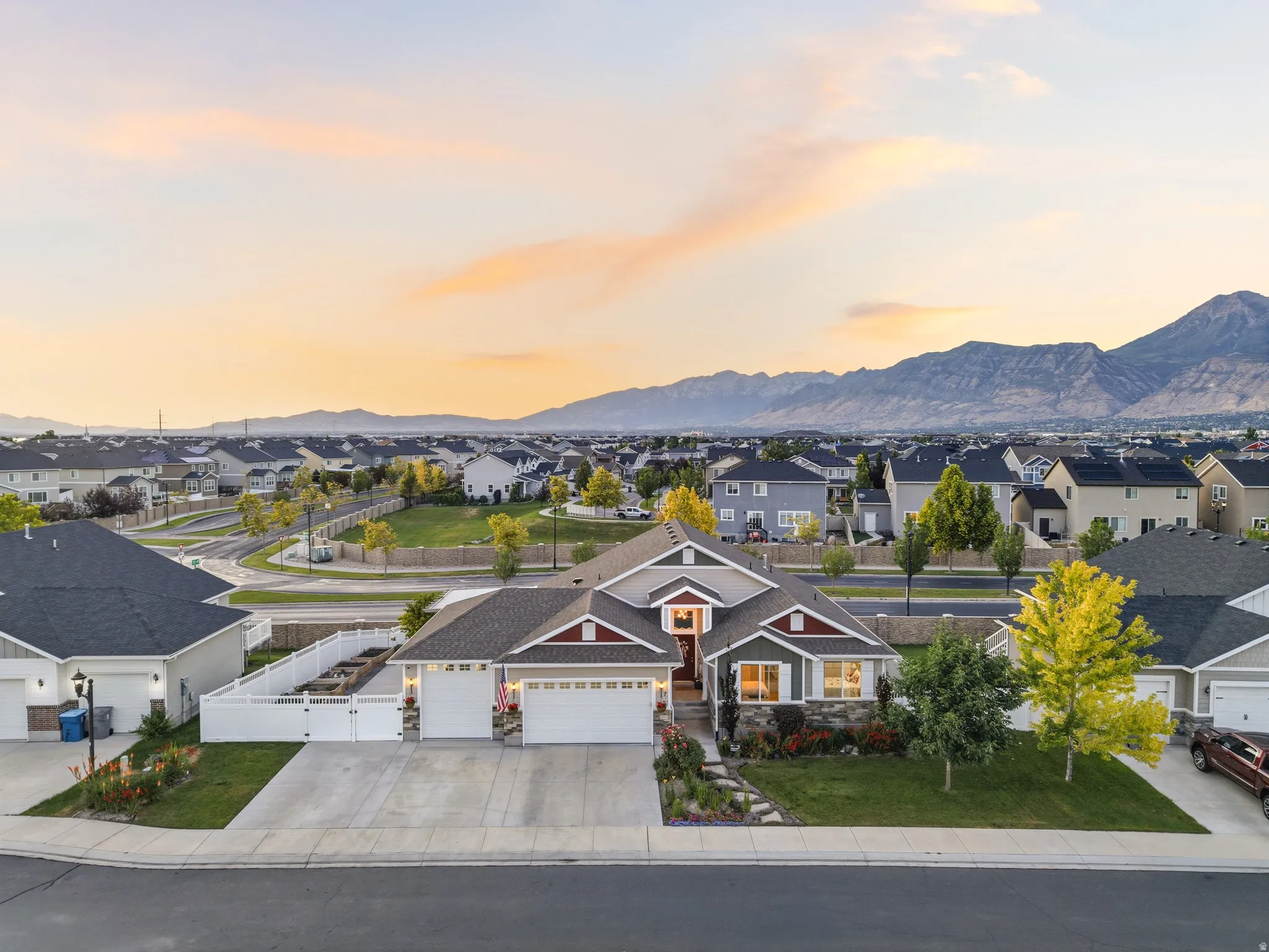 Modern Craftsman-style residence featuring a combination of siding and stone veneer