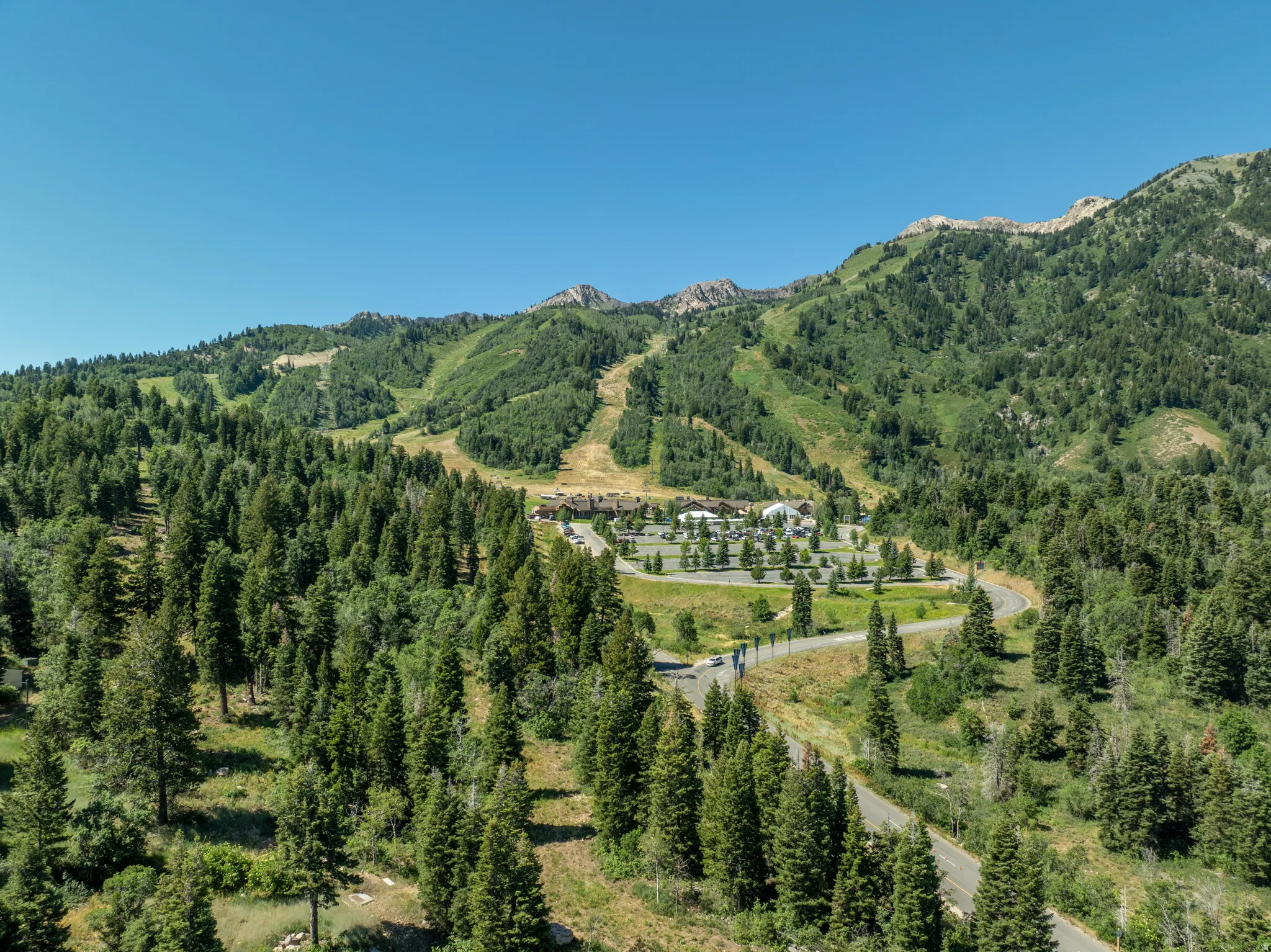 Snowbasin resort with dozens of trails and runs and home to future olympic events.