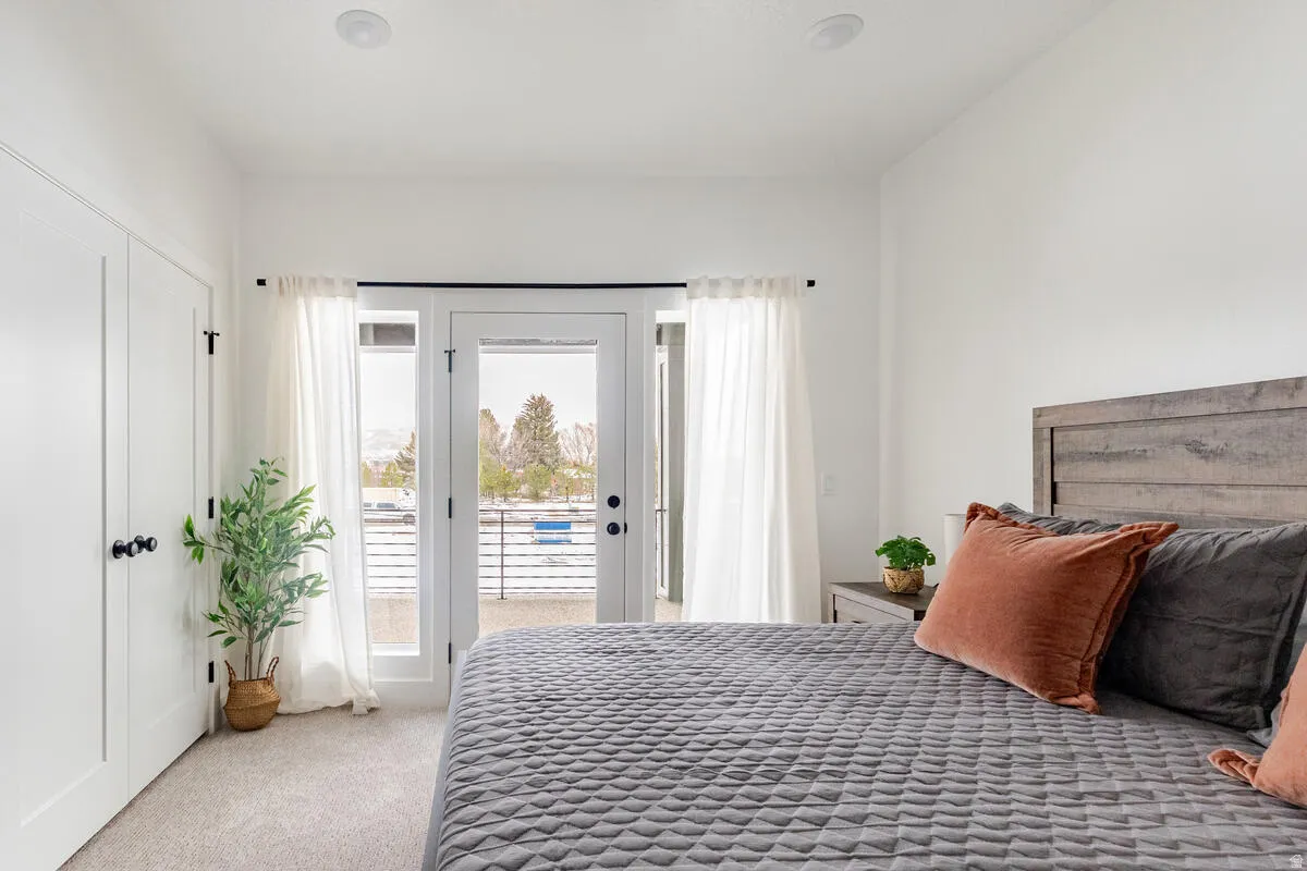 View from the entrance to 2nd large bedroom with king bed and private balcony/deck