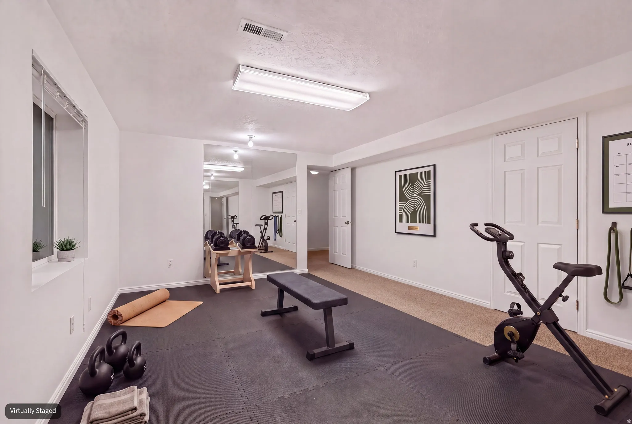 Spacious flex room (virtually staged as exercise room)